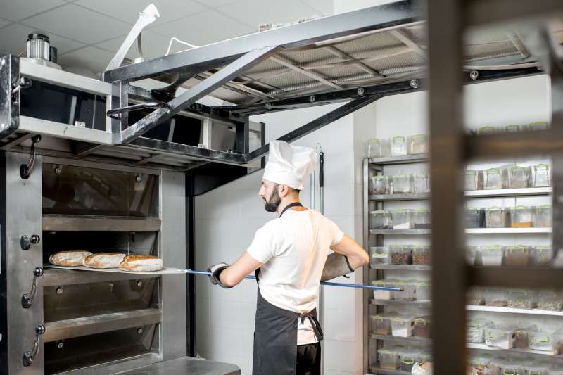 Fly Screens for Commercial Kitchens helping maintain hygiene and airflow in a professional food preparation environment with retractable insect protection by Gozito UK